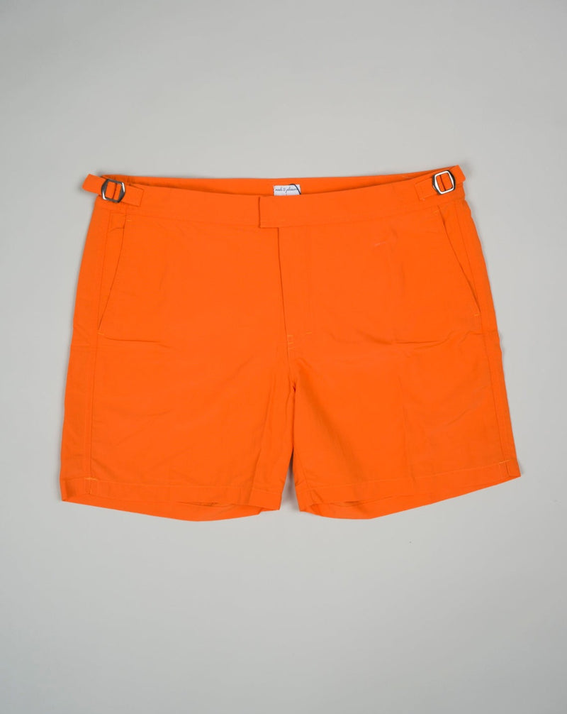 Slim fit Fits true to the size. If in doubt of your size, please contact us HERE 100% Polyamide Color: Orange Side Adjusters Two side pockets and one back pocket Made in Portugal Seersucker swim trunks with side adjusters.