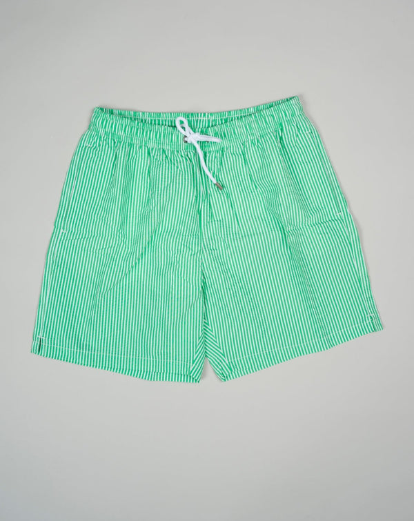 Slim fit Fits true to the size. If in doubt of your size, please contact us HERE 55% Polyamide 45% Cotton Color: Green Drawstring Two side pockets and one back pocket Made in Portugal Seersucker swim trunks with adjustable drawstring waistband.  The weave of seersucker fabric gives it a distinctive gentle wrinkled look