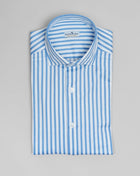 Jersey shirts are very comfortable and this shirt makes no exemption. It looks like dress shirt and feels like knitwear. We think this kind of garments represent modern tailoring very well. They honor classic styles and lines, but they are made to be super comfortable and practical.  100% Cotton Col. 01 / White & Light Blue Made in Italy