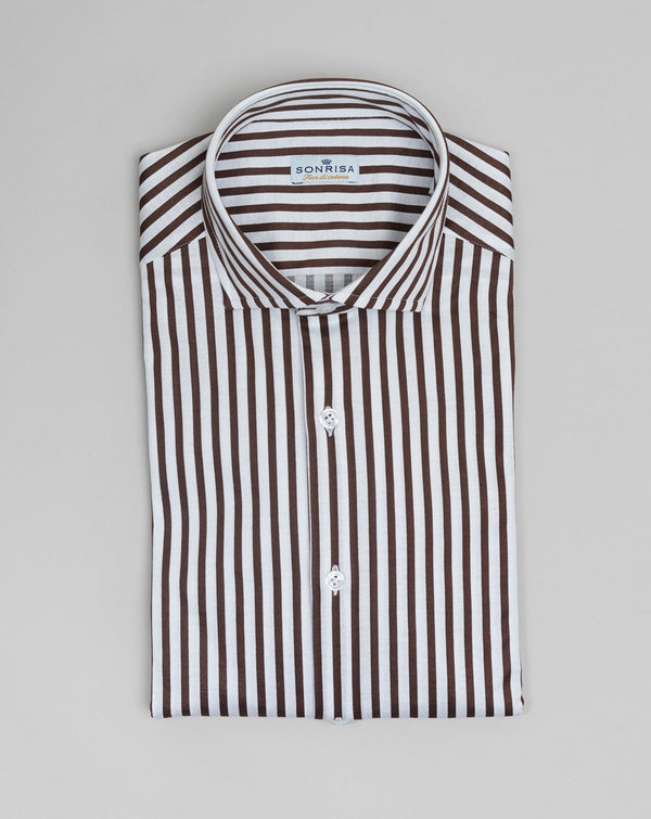 Jersey shirts are very comfortable and this shirt makes no exemption. It looks like dress shirt and feels like knitwear. We think this kind of garments represent modern tailoring very well. They honor classic styles and lines, but they are made to be super comfortable and practical.  100% Cotton Col. 03 / White & Brown Made in Italy