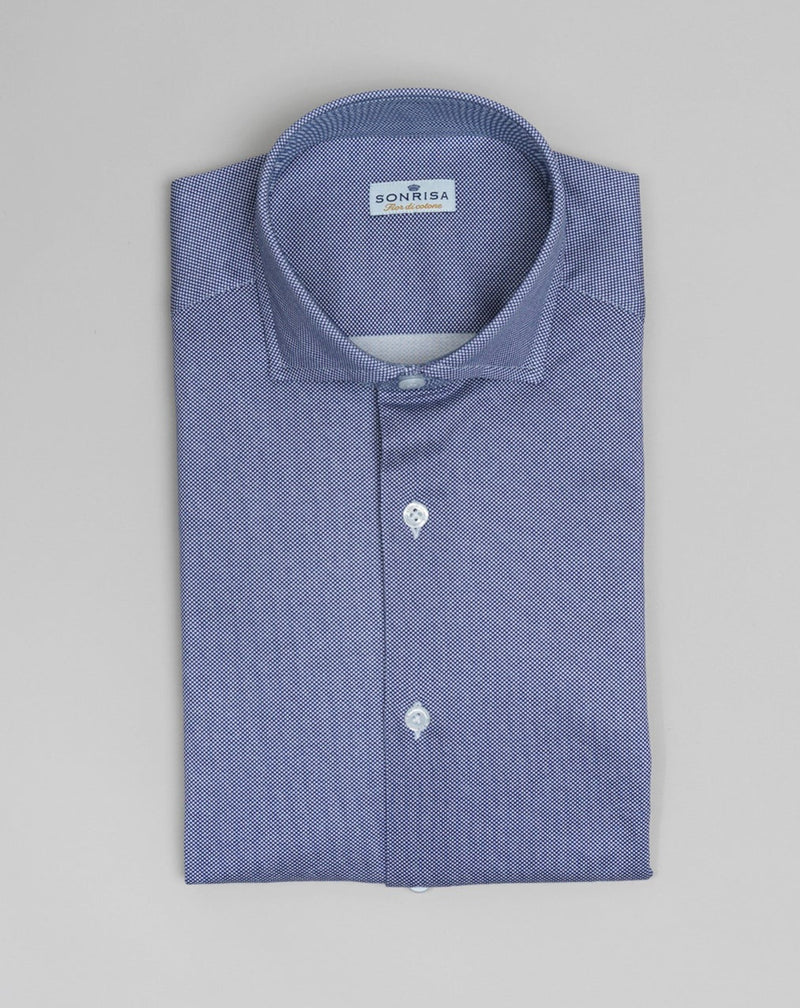 Jersey shirts are very comfortable and this shirt makes no exemption. It looks like dress shirt and feels like knitwear. We think this kind of garments represent modern tailoring very well. They honor classic styles and lines, but they are made to be super comfortable and practical.  100% Cotton Col. 02 / Blue Made in Italy 