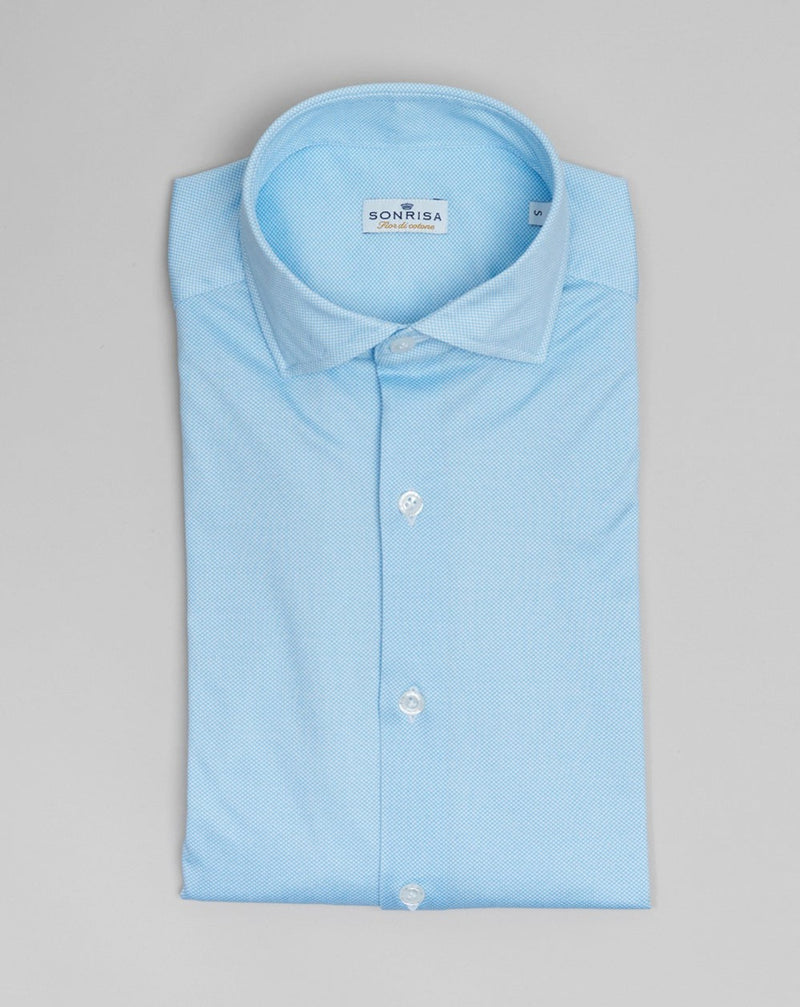 Jersey shirts are very comfortable and this shirt makes no exemption. It looks like dress shirt and feels like knitwear. We think this kind of garments represent modern tailoring very well. They honor classic styles and lines, but they are made to be super comfortable and practical.  100% Cotton Col. 01 / Light Blue Made in Italy