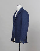 Composition: 58% Virgin Wool 42% Linen Modello: 1SMC22K Article: 470001U Color: I358 Blue Slim fit. Take your normal size Unlined Unconstructed shoulder  2 Buttons Side vents Notch lapel Patch pockets Made in Italy