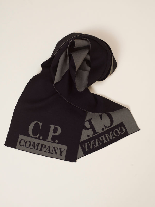 C.P. Company logo scarf.   Breathable 60% Wool 40% Acrylic Art. 11CMAC345A005292J Color:  999 / Black One Size
