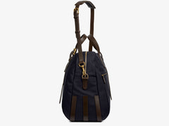 Measurements: L: 47 H: 42 W: 31 (12) cm Body: Waterproof hard woven Italian nylon Fabric composition: PA 42% CO 38% PU 20% / 826 g/m Trimmings: Dark brown custom developed vegetable tanned full-grain bridle leather Lining: 100% cotton in navy colour Hardware: Solid brass with varnish protection Zipper: Hand polished YKK Excella The perfect holdall for the active lifestyle. The M/S Something easily does the job for any trip