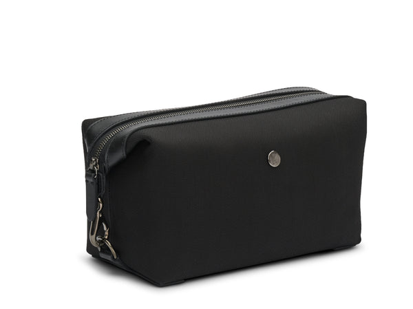 Measurements:    L: 26  H: 14  W: 12cm Body: Heavy-duty nylon (waterproof) Fabric composition: PA 64% PL 19% PU 17%  /  862g pr. meter Trimmings:  Lining: White PVC Hardware: Gunmetal - Solid brass w. varnish protection Zipper: Hand polished YKK Excella Art. No. MS131412 WASHBAG NECESSITY BLACK