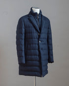 Long Down Overcoat by Herno. Removable zippered bib and slanted side pocket for practicality... to warm your hands that is.  Upper: 70%Viscose 30%Virgin Wool Filling: 80% Down 20% Feather PI000906U 33278 Col. 9200 / Navy