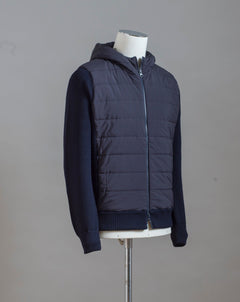  Gran Sasso Rain Wool zippered hoodie with nylon front. Rain wool water-repellent treatment makes this garments water repellent.   Fibres of the garment has been treated with TEFLON™ fabric protector applied by Zegna Baruffa Lane Borgosesia Full Zip closure Removable hood Ribbed hem and cuffs Article: 23177/24613 Colore: 598 / Dark Blue Made in Italy