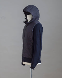  Gran Sasso Rain Wool zippered hoodie with nylon front. Rain wool water-repellent treatment makes this garments water repellent.   Fibres of the garment has been treated with TEFLON™ fabric protector applied by Zegna Baruffa Lane Borgosesia Full Zip closure Removable hood Ribbed hem and cuffs Article: 23177/24613 Colore: 598 / Dark Blue Made in Italy