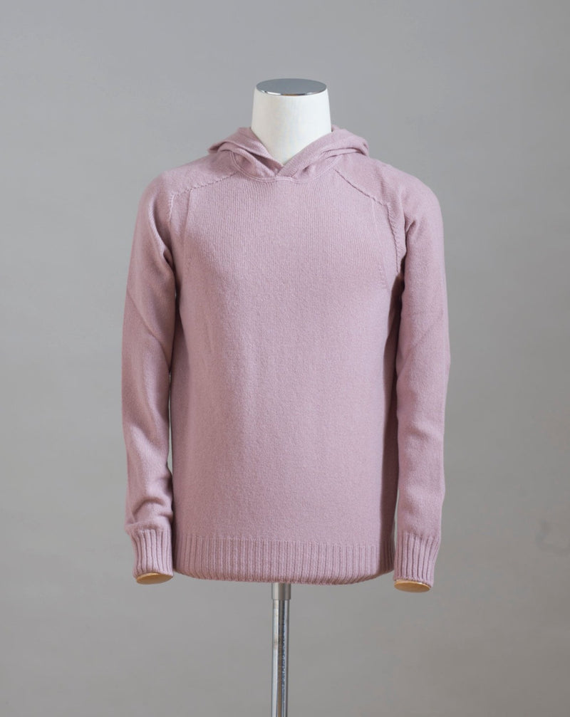 Hooded Sweater 100% Wool  Ribbed hem and cuffs Article:  24171/25024 Colore: 207 / Dusty Rosa Made in Italy Hooded stitch sweater in Super Geelong wool. A sporty garment that you can match with jeans for an urban look or with jogging-style trousers for a sporty and refined outfit 