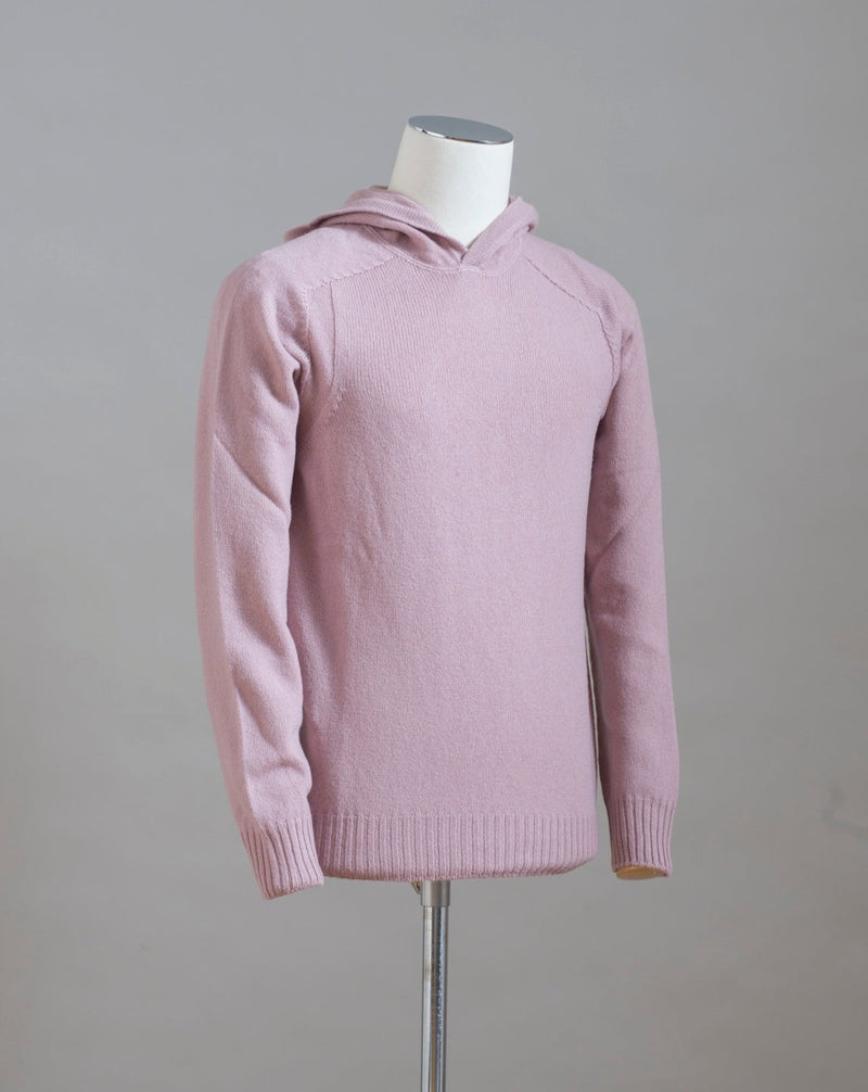 Hooded Sweater 100% Wool  Ribbed hem and cuffs Article:  24171/25024 Colore: 207 / Dusty Rosa Made in Italy Hooded stitch sweater in Super Geelong wool. A sporty garment that you can match with jeans for an urban look or with jogging-style trousers for a sporty and refined outfit 