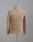 Heavy ribbed jacket made of 5-Ply Super Geelong wool. Geelong wool has as soft touch as cashmere, yet it is remarkably durable. Elegant, comfortable and practical wool quality, perfect for a chunky garment like this.  100% Geelong wool 3 Patch pockets 3 Buttons Mod.  10166/25028 Col. 116 / Beige Made i Italy