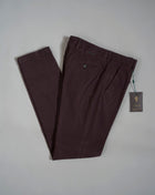 Slim fit Fits true to the size. If in doubt of your size, please contact us HERE 98% Cotton 2% Elastane Color: 022 Gianduia Button closure with zippered fly Slanted front pockets and two back pockets Model: Morello  Article: xgab Made in Martina Franca, Italy This kind of cotton trouser are one of the corner stones of every man’s casual wardrobe, the slim fit chino.