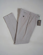 Slim fit Fits true to the size. If in doubt of your size, please contact us HERE 98% Cotton 2% Elastane Color:   701 Conza / Light Grey Button closure with zippered fly Slanted front pockets and two back pockets Model: Morello  Article: xgab Made in Martina Franca, Italy This kind of cotton trouser are one of the corner stones of every man’s casual wardrobe, the slim fit chino.