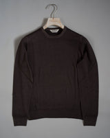 Gran Sasso Vintage merino wool knit. It has been garment dyed to achieve nice vintage look. This means it has more vivid compared to yarn dyed knitwear.   Vintage Merino is a core quality in our Gran Sasso collection. We offer a lighter quality for spring/summer and heavier for autumn/ winter season.   Crew neck 100% merino wool Vintage washed (garment dyed) Ribbed hem and cuffs Fashion fit Article: 55167/22792 Colore:   308 / Brown Made in Italy