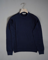Gran Sasso Vintage merino wool knit. It has been garment dyed to achieve nice vintage look. This means it has more vivid compared to yarn dyed knitwear.   Vintage Merino is a core quality in our Gran Sasso collection. We offer a lighter quality for spring/summer and heavier for autumn/ winter season.   Crew neck 100% merino wool Vintage washed (garment dyed) Ribbed hem and cuffs Fashion fit Article: 55167/22792 Colore:   905 / Navy Made in Italy