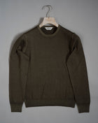 Gran Sasso Vintage merino wool knit. It has been garment dyed to achieve nice vintage look. This means it has more vivid compared to yarn dyed knitwear.   Vintage Merino is a core quality in our Gran Sasso collection. We offer a lighter quality for spring/summer and heavier for autumn/ winter season.   Crew neck 100% merino wool Vintage washed (garment dyed) Ribbed hem and cuffs Fashion fit Article: 55167/22792 Colore:   490 / Green Made in Italy  