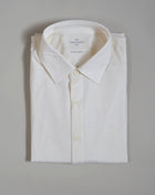 Gran Sasso Travel Wool full buttoned shirt. Travel Wool is a machine-washable and tumbler-dry extra-fine merino yarn, stain-resistant with eco-idro treatment and, thanks to the tight and narrow weave of the yarn, it is extremely resistant to wear and pilling.  Long Sleeves Full buttoned 100% Merino Travel wool Art.  60122/69001 Col. 001 /  Off White Made in Italy