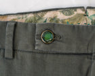This kind of cotton trouser are one of the corner stones of every man’s casual wardrobe, the slim fit chino. These are made in a slim cut and garment dyed and washed which give the trousers a beautiful and unique colour. These are the trousers that go with everything from t-shirts to jackets  98% Cotton 2% Elastan Color: Militare military green Button closure with zippered fly Changeable button in front Slanted front pockets and two back pockets Model: Morello  Article: xgab Made in Martina Franca, Italy