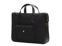 M/S Briefcase is a handy yet stylish casual bag for the office.  Separate inside laptop compartment (15"), and opposite two open "slit down" pockets. It has an outside signature pocket with enough room for an adaptor, etc. and two slim, slit-down pockets on either side for a mobile phone, iPod, pencils and more. Comes with an adjustable and detachable shoulder strap.  Holds up to 15" laptop