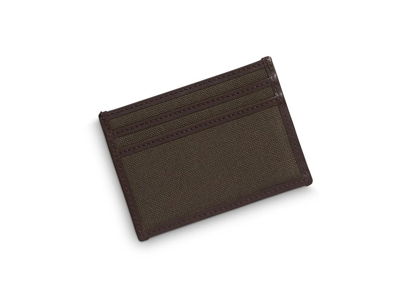 An everyday essential. Canvas/leather cardholder with 3 slots for credit cards on each side. Open pocket in the middle for bills, notes etc.  Measurements: L: 10  H: 7,5  W: 0,5cm Body: Tight-woven cotton canvas Fabric composition: CO 94% PU 4% PC 2% - 709 gr/rm Trimmings: Custom developed dark brown vegetable tanned full-grain bridle leather  Lining: 100% cotton in Army colour  Art. no. MS090112