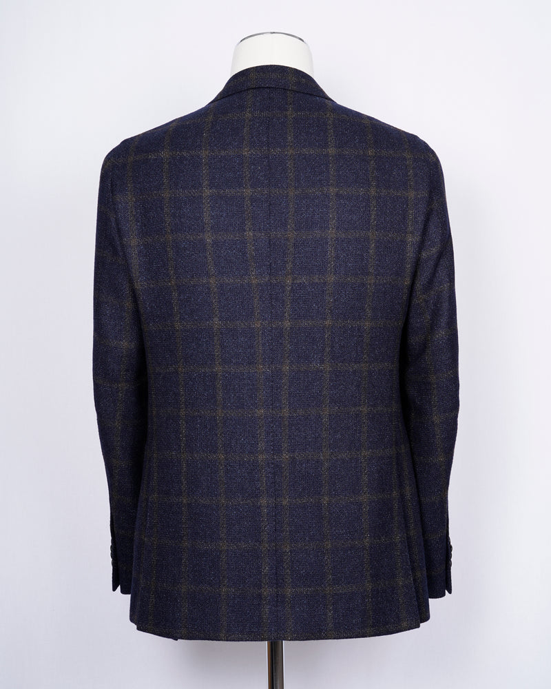 caruso full canvas Fully lined Unconstructed shoulder 3 roll 2 buttoning Side vents Notch lapel Patch pockets Composition: 72% wool, 25%coton, 3% cashmere Color: Navy and Brown Modello: Aida / ASM2JM304F Article: 505179 Colore: 0120 Made in Italy