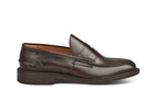 Tricker’s classic step in Penny loafer combines comfort with quiet confidence. In Espresso with Brown storm welt, leather uppers and linings for even greater refinement, channelled and stitched leather sole. Tricker's James Penny Loafer / Espresso