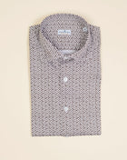 Jersey shirts are very comfortable and this shirt makes no exemption. It looks like dress shirt and feels like knitwear. We think this kind of garments represent modern tailoring very well. They honor classic styles and lines, but they are made to be super comfortable and practical.   100% cotton Semi cutaway collar Single cuffs Removable collar bones Model. FJ15 Article. J913 Color. 01 / White and Brown