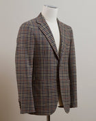 Gun club jacket by Gaiola Napoli.  Soft shoulders and comfortable fit like only Naepolitans can do. Here you have the best of both worlds - sharp look and super comfortable fit.  Unconstructed shoulder 3 roll 2 Buttoning Side vents Notch lapel Patch pockets Composition: 100% wool Lining: 100% CU Color: Beige, brown, green & midnight blue Linea: Gaiola Modello: GJ02 Article: TW22044F Colore: 77 Made in Naples, Italy