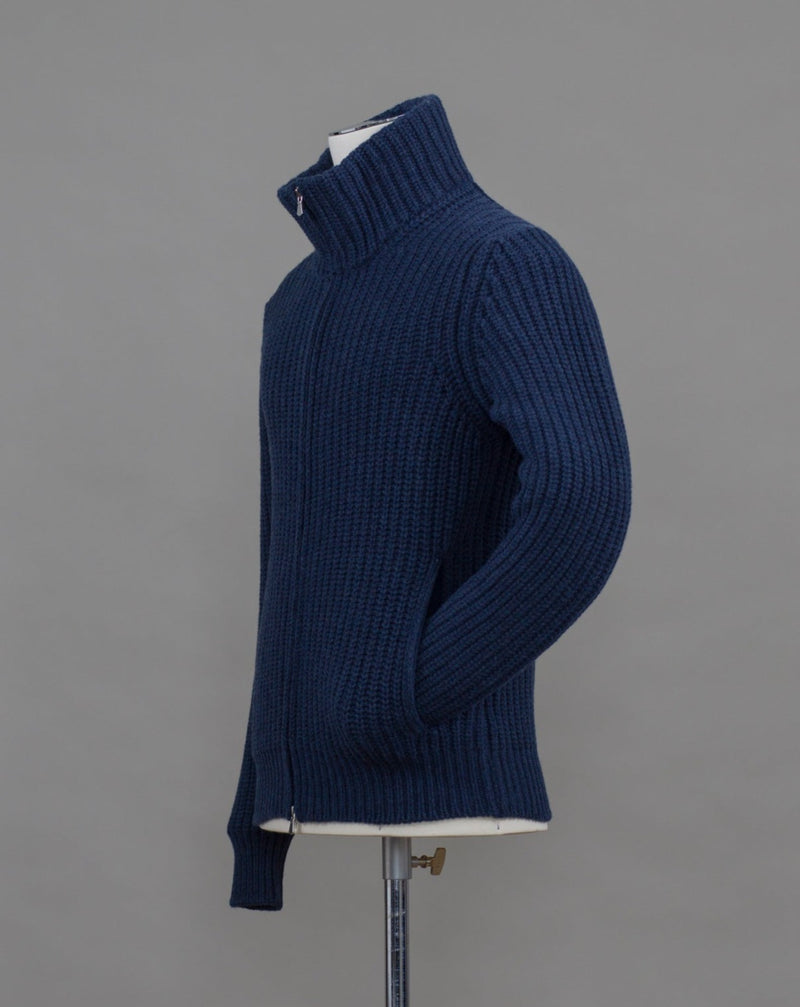 Gran Sasso heavy ribbed knitted jacket with full length two way zip in front. Great piece for layering as the weather gets colder. Art. 10155 / 19643 Col. 589 / Blue 80% Wool 10% Cashmere 10% Viscose
