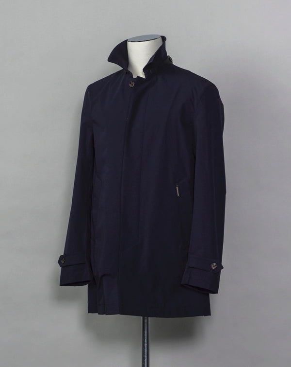 Unlined and unconstructed car coat from Montecore. Two-way-stretch fabric for maximum comfort.  Car coat  5 buttons in front  Slanted front pockets Center back vent Article: S04MUC600 Compositon: 83% Polyamide 17% Elastan Color: 89 / Dark Navy