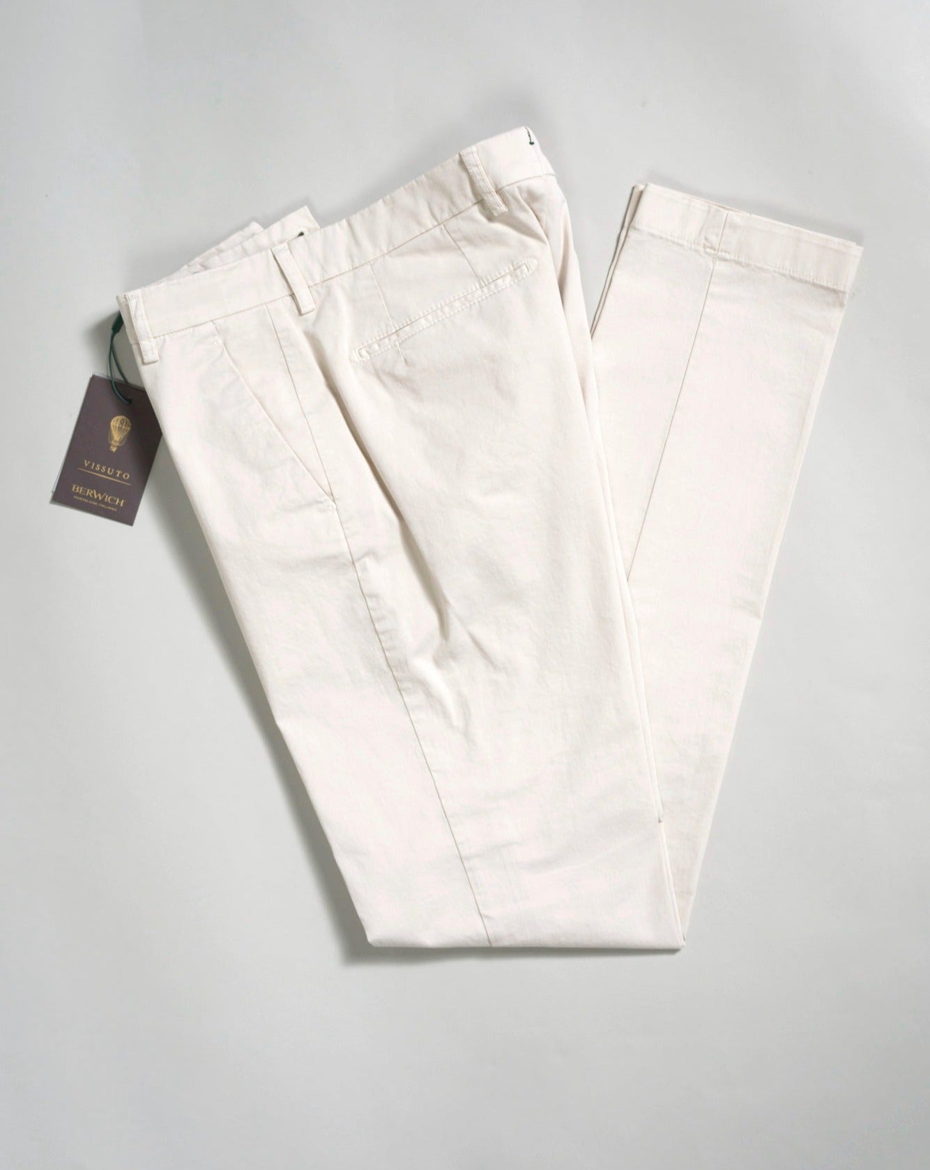 Morello slim fit chinos. A true corner stone of every man’s casual wardrobe. Combine with a smart blazer or a nice knit.   By far our best selling model from Berwich. It has been in our collection for several years and will be there in the future for sure.  'Composition: 98% Cotton 2% Elastan Model: Morello-GD (Garment-Dyed) Article: ts0001x Color: Latte / 802 Made in Martina Franca, Italy