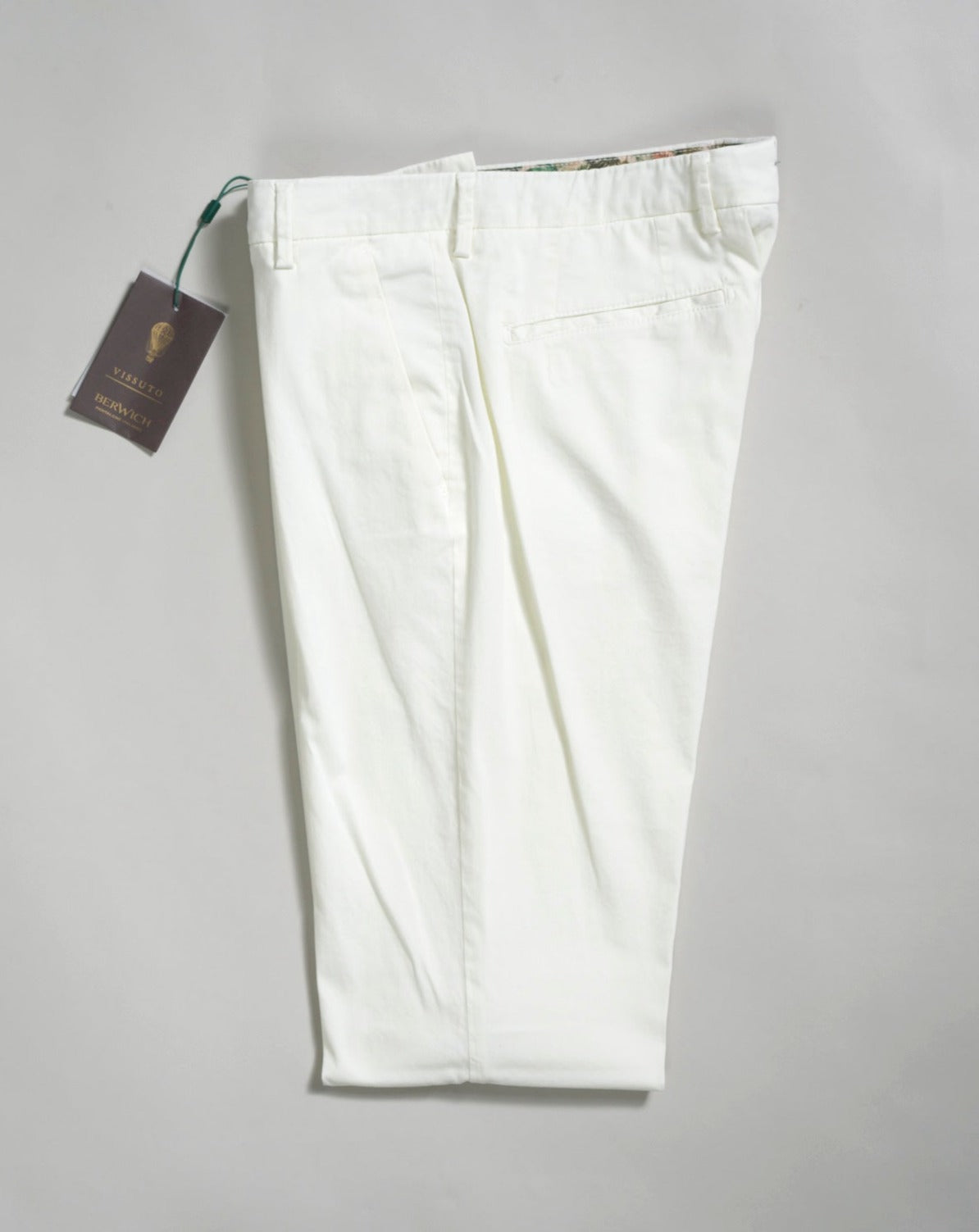 Berwich Morello with a little silk added to the fabric for a soft and luxurious touch. Great summer chinos.  Composition: 88% Cotton 10% Silk 2% Elastan Model: Morello-GD (Garment dyed) Article: tf0599x Color: Panna / 001 Made in Martina Franca, Italy