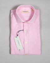 Pink long sleeved linen shirt from Ghirardelli. Washed to give the garment soft touch and relaxed look.  Composition: 100% Linen Color: Pink Long sleeves Removable collar bones