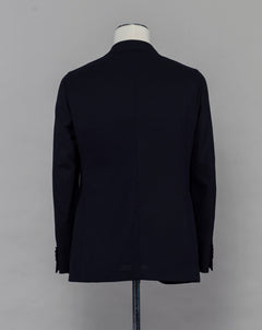 Caruso blazer impeccably tailored in Soragna, Parma, Italy. Stunning lightness and ease of movement without losing the classic tailored elegance. These are some of the ingredients that make Italian tailoring world famous and you can find it all in Caruso garments.  Beautiful handmade detailing and naturally with a full canvas structure inside.  Full canvas Half lined  Unconstructed shoulder Mod. Aida 100% wool Col. 0110 / Navy