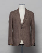 Tagliatore linen/wool blazer. Model Montecarlo, which is familiar to most of our regular customers. Slim fit with light unconstructed make. Comfortable to wear and easy to combine with almost anything.  If in doubt of your size, please contact us HERE.  Composition: 60% Linen 40% Virgin wool Modello: Monte Carlo / 1SMC22K Color: Brown / T1056 Unconstructed Unlined 2 Buttons Notch lapel Patch pockets Side vents Made in Martina Franca, Italy