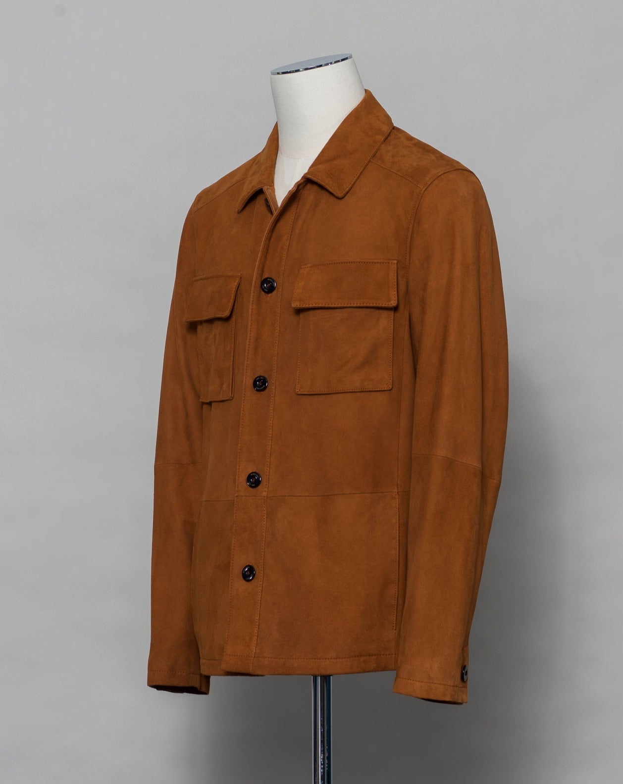 Light jacket made of soft goatskin suede and napped inside. Super soft leather make a truly luxurious interpretation of a field jacket.  100% goatskin suede, napped inside Body: unlined, sleeve lining: 100% polyamide Embossed logo Inside pockets Mod: 31 1006 ZN 737