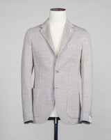 Unconstructed Patch pockets 2 Buttons Side vents Article: 35206 Model: 2811 Color: Beige & White / 2 Composition: 57% Linen 43% Cotton L.B.M. 1911 Linen & Cotton Houndstooth Jersey Jacket / Beige
