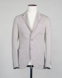 Unconstructed Patch pockets 2 Buttons Side vents Article: 35206 Model: 2811 Color: Beige & White / 2 Composition: 57% Linen 43% Cotton L.B.M. 1911 Linen & Cotton Houndstooth Jersey Jacket / Beige