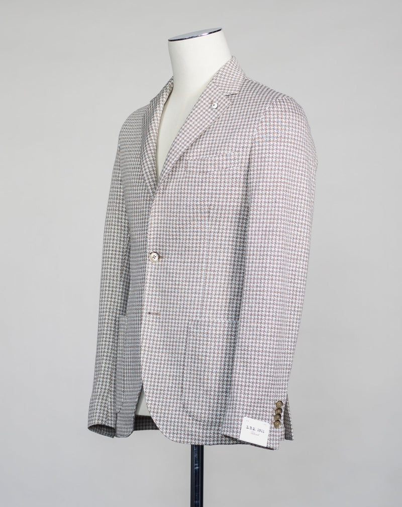 Unconstructed Patch pockets 2 Buttons Side vents Article: 35206 Model: 2811 Color: Beige & White / 2 Composition: 57% Linen 43% Cotton L.B.M. 1911 Linen & Cotton Houndstooth Jersey Jacket / Beige