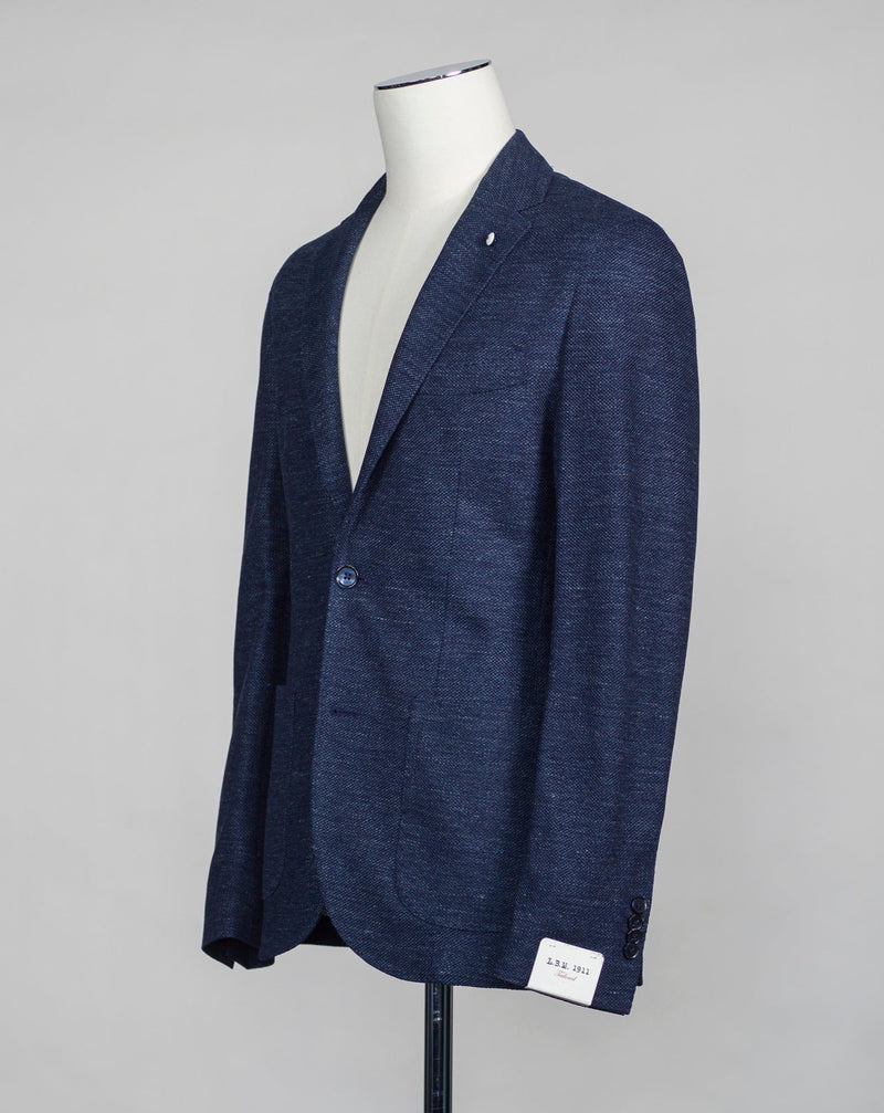 Unconstructed Patch pockets 2 Buttons Side vents Article: 35203 Model: 2811 Color: Blue Melange / 5 Composition: 59% Linen 41% Cotton L.B.M. 1911 Linen & Cotton Jersey Jacket / Blue Melange