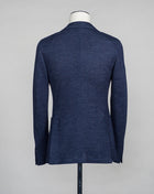 Unconstructed Patch pockets 2 Buttons Side vents Article: 35203 Model: 2811 Color: Blue Melange / 5 Composition: 59% Linen 41% Cotton L.B.M. 1911 Linen & Cotton Jersey Jacket / Blue Melange