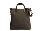 Measurements:  L: 37 x H: 41 x W: 10 cm Fabric composition: CO 94% PU 4% PC 2% - 709 gr/rm Body: Tight-woven cotton canvas Trimmings: Custom developed dark brown vegetable tanned full-grain bridle leather Lining: 100% cotton in army colour Hardware: Solid brass with varnish protection  Zipper: Hand polished YKK Excella Art. No. MS250112 As the first style ever launched in the Contemporary collection, the M/S Shopper has grown to become one of the most iconic styles of the Mismo