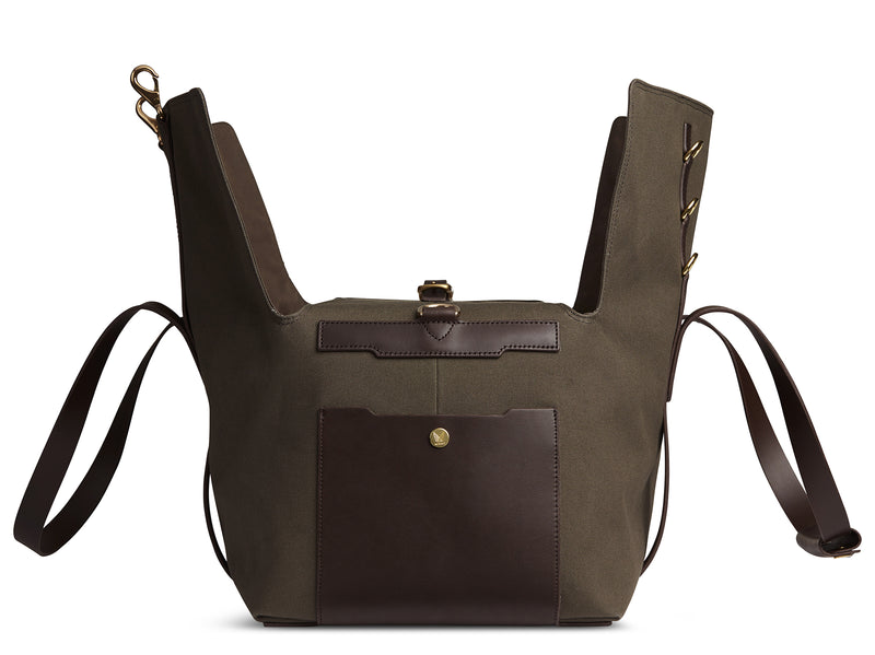 Measurements: L: 52  H: 25  W: 28(26) cm Body: Tight-woven cotton canvas Fabric composition: CO 94% PU 4% PC 2% - 709 gr/rm Trimmings: Dark brown custom developed vegetable tanned full-grain bridle leather Lining: 100% cotton in army colour  Hardware: Solid brass with varnish protection  Zipper: Hand polished YKK Excella Art. No. MS410114 Travel, gym, tennis - wherever life’s adventures  the M/S Supply a great addition. Elongated handles make easy to carry bag by hand, hung over shoulder worn rucksack mismo