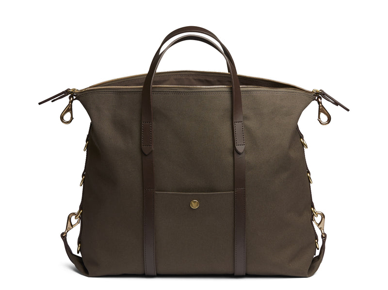 Measurements:   L: 42(52)  H: 31(41)  W: 12(4) cm Body: Tight-woven cotton canvas Fabric composition: CO 94% PU 4% PC 2% - 709 gr/rm Trimmings: Dark brown custom developed vegetable tanned full-grain bridle leather Lining: 100% cotton in army colour  Hardware: Solid brass with varnish protection  Zipper: Hand polished YKK Excella Art. No. MS120110 A flexible duffle/work bag that can be adjusted in size by attaching the snap hooks in each corner of the bag to the brass D-rings on the gusset