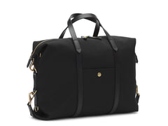 Measurements:    L: 42(52)  H: 31(41)  W: 12(4) cm Body: Waterproof hard woven Italian nylon  Fabric composition: PA 42% CO 38% PU 20%  /  826g /m Trimmings: Dark brown custom developed vegetable tanned full-grain bridle leather Lining: 100% cotton in army colour  Hardware: Solid brass with varnish protection  Zipper: Hand polished YKK Excella Art. No. MS121312 A flexible duffle/work bag that can be adjusted in size by attaching the snap hooks in each corner of the bag to the brass D-rings on the gusset. 